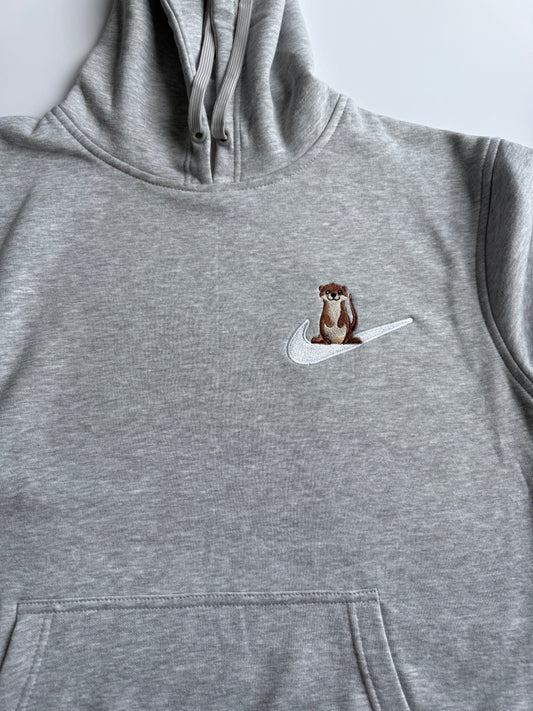 Bluza z haftem Wydry na łyżwie