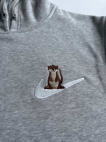 Bluza z haftem Wydry na łyżwie