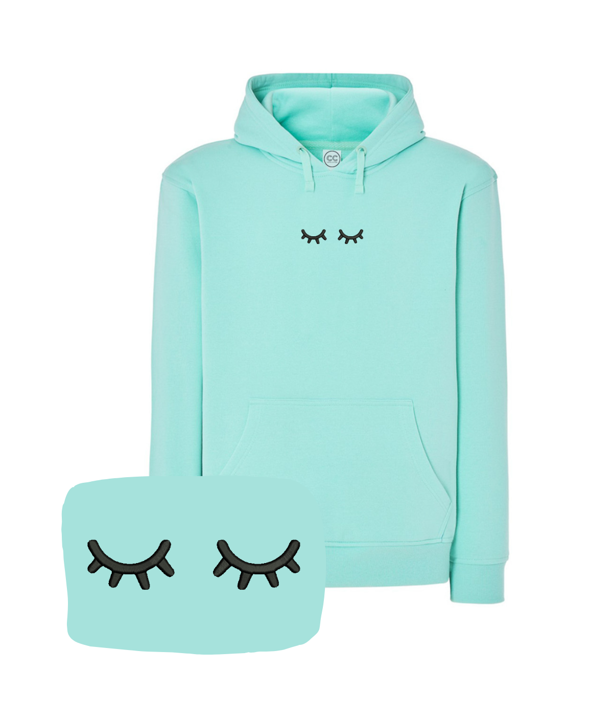 Pink sweatshirt with embroidered sleeping eyes design from CustomClothes.pl, featuring detailed eye embroidery on the front.